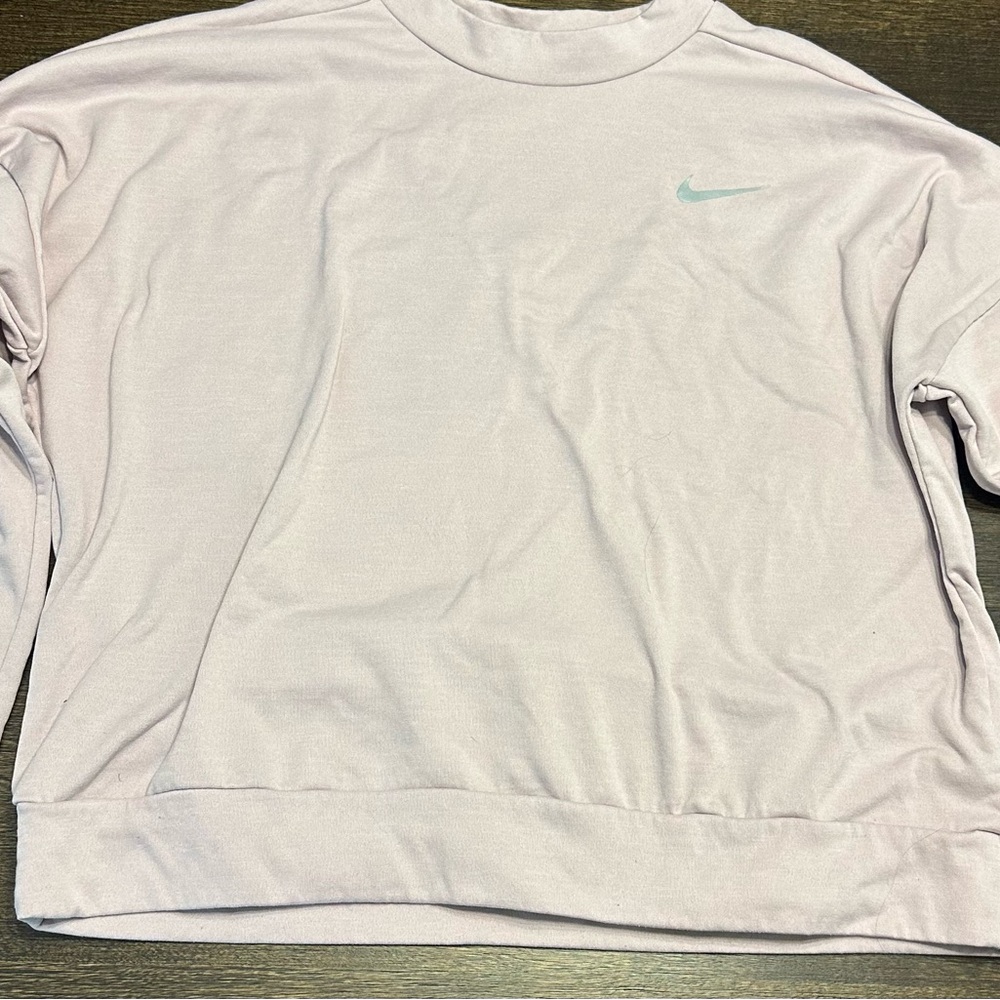 A Nike long sleeve size medium. Dusty rose color.